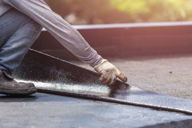 Professional Waterproofing technician working in Winona Lake, IN